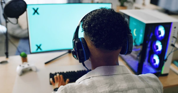 boy-computer-screen-gamer-headset-600nw-2714718877